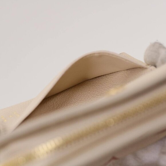 LOUIS VUITTON Monogram Empreinte Portefeuille Clare Wallet White M81927 42904S - Picture 9 of 16